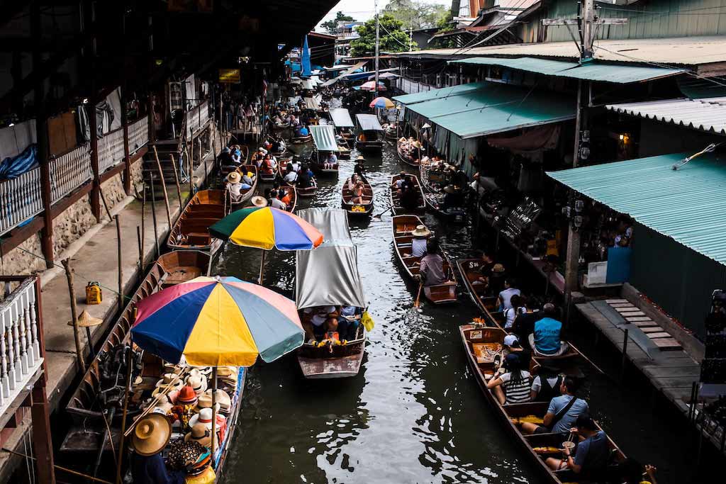Visiting A Floating Market Is A Must-Have Experience In Thailand. 